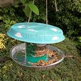 Bird Feeder Out Of Recycled Materials photos